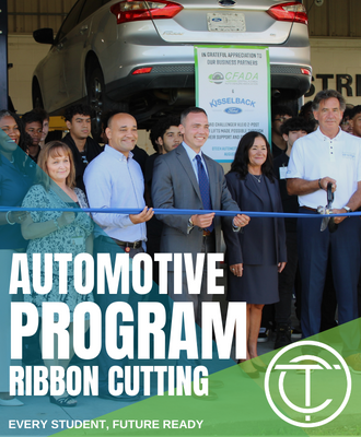  Image of a crowd cutting a ribbon